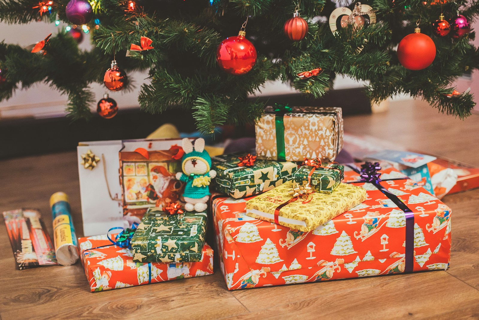 Photo by Eugene Zhyvchik assorted-color gift box under Christmas tree